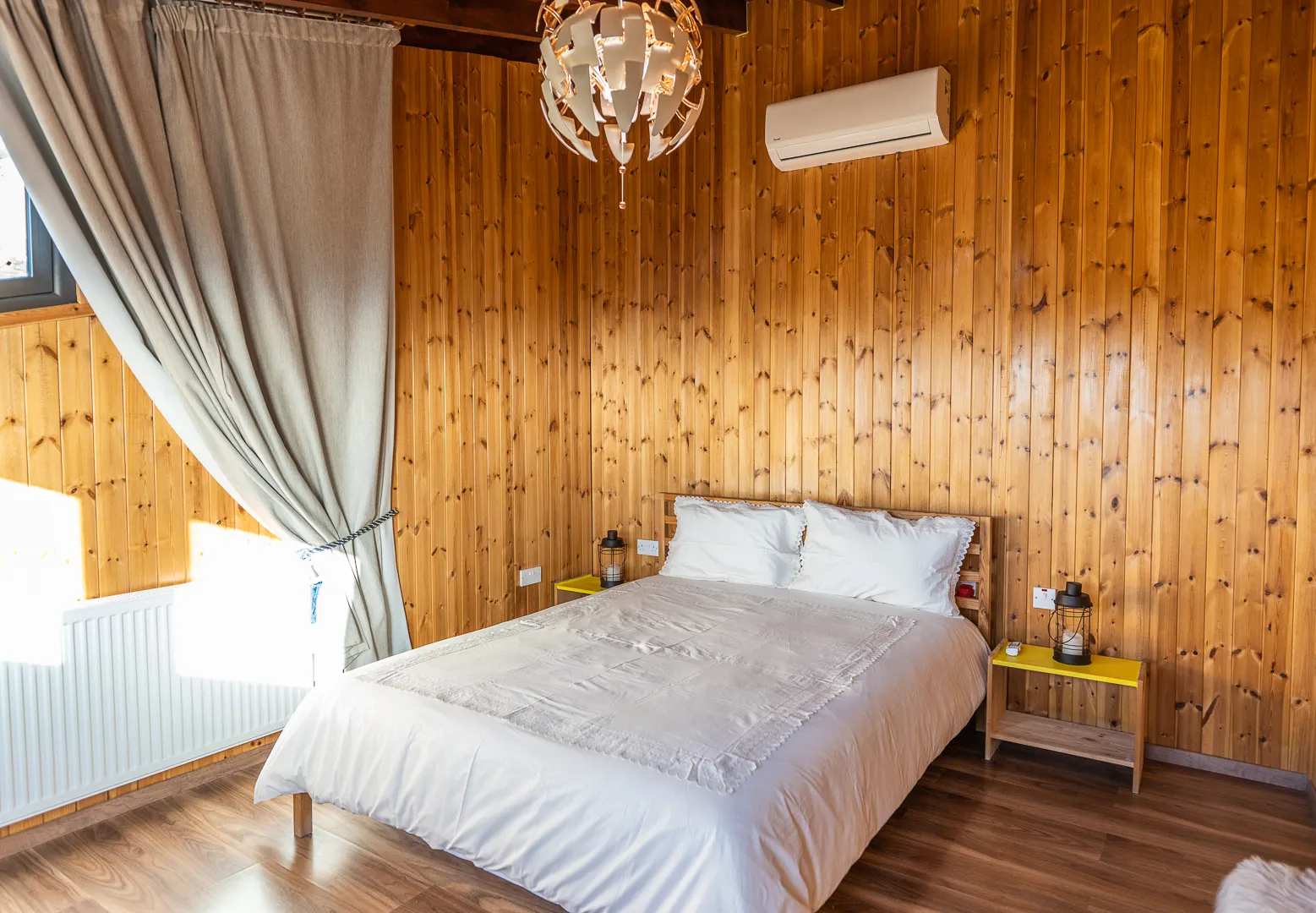Upstairs wood-panelled bedroom