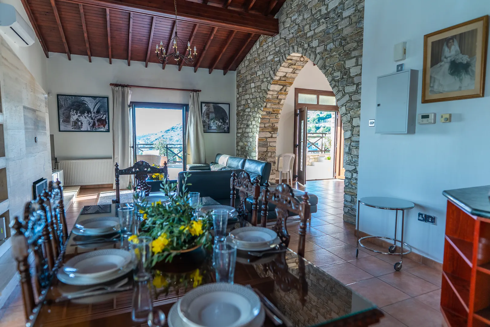 Dining table for 8 under the wooden ceiling