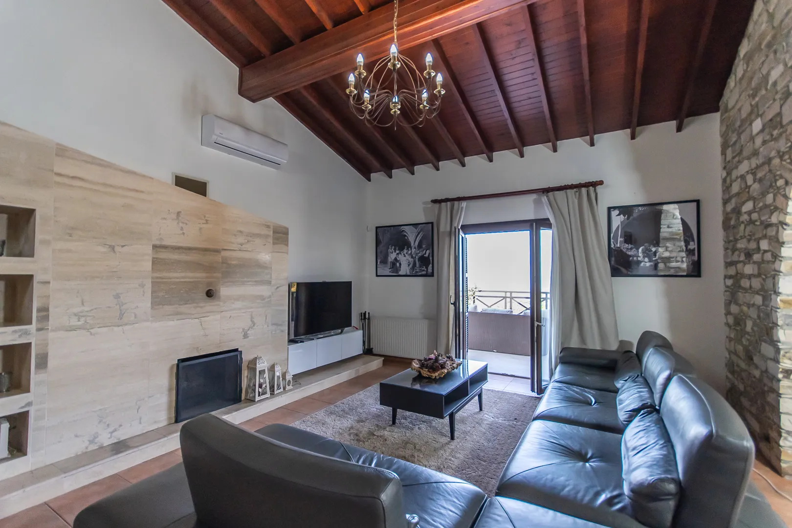Living room with fireplace and smart TV