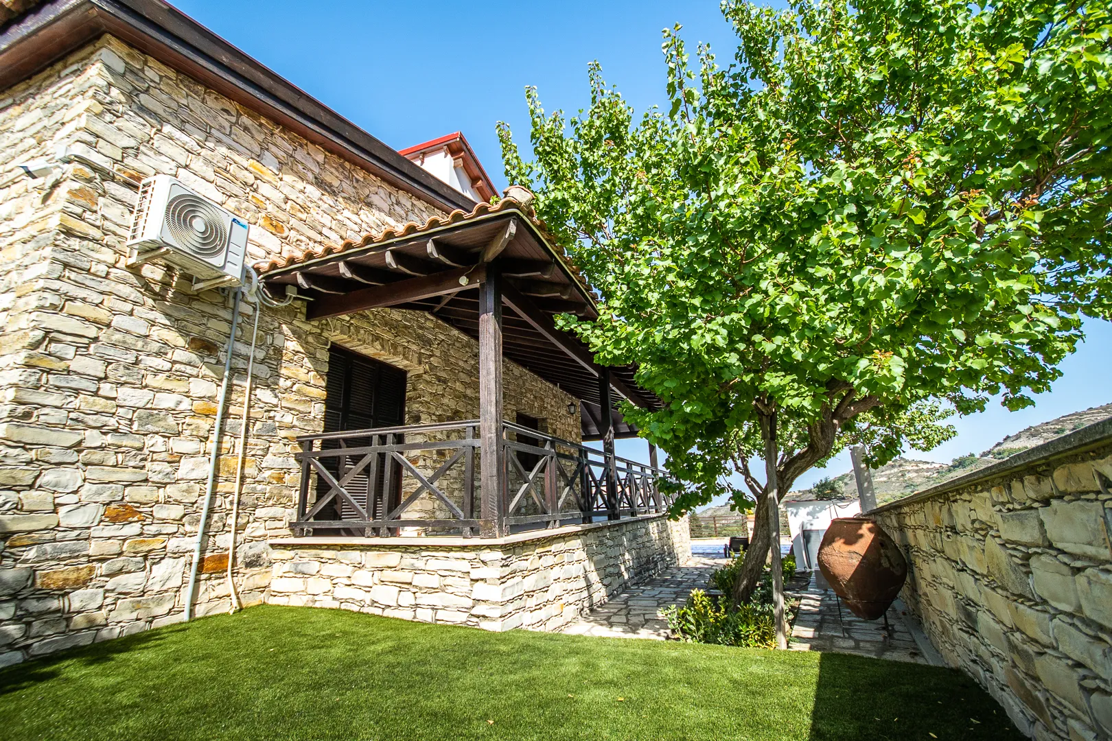 Wooden veranda beside the fruit trees