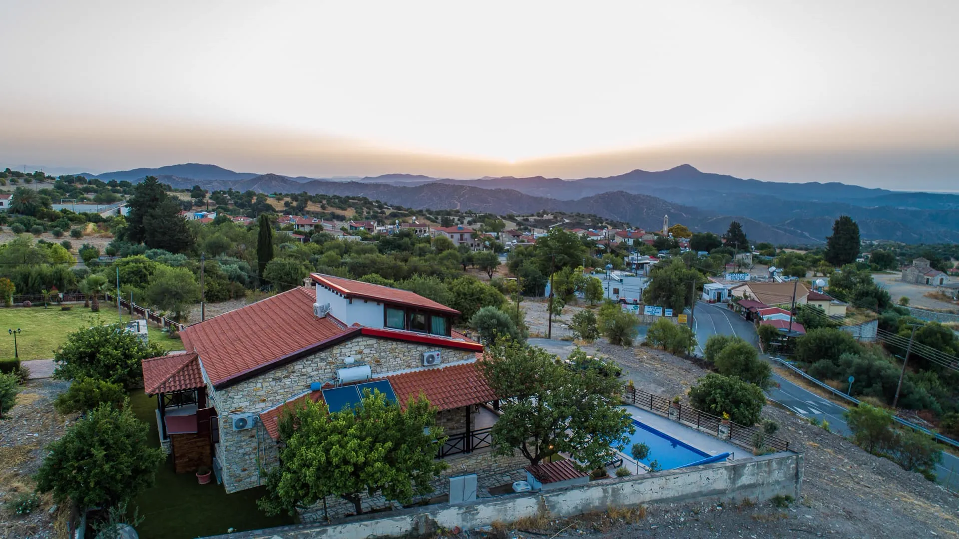 The villa and garden in the evening light